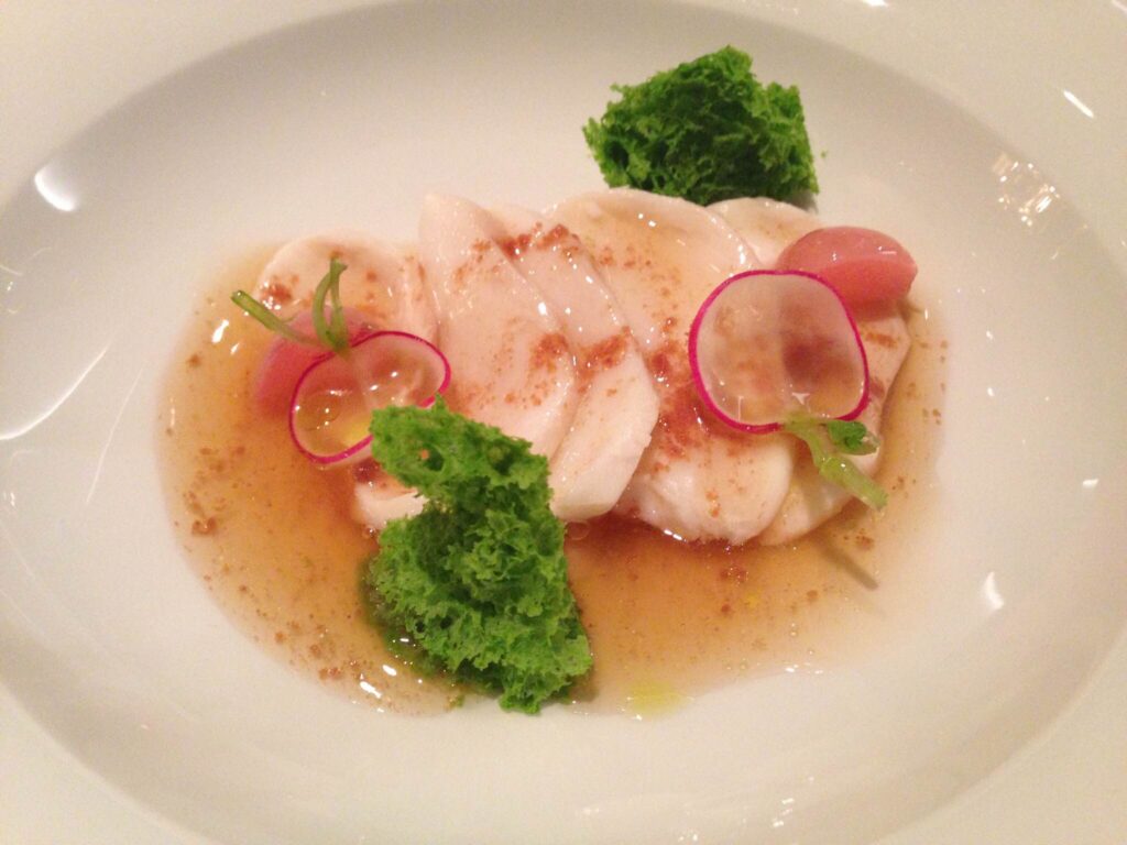 merluzzo con brodo di prosciutto crudo