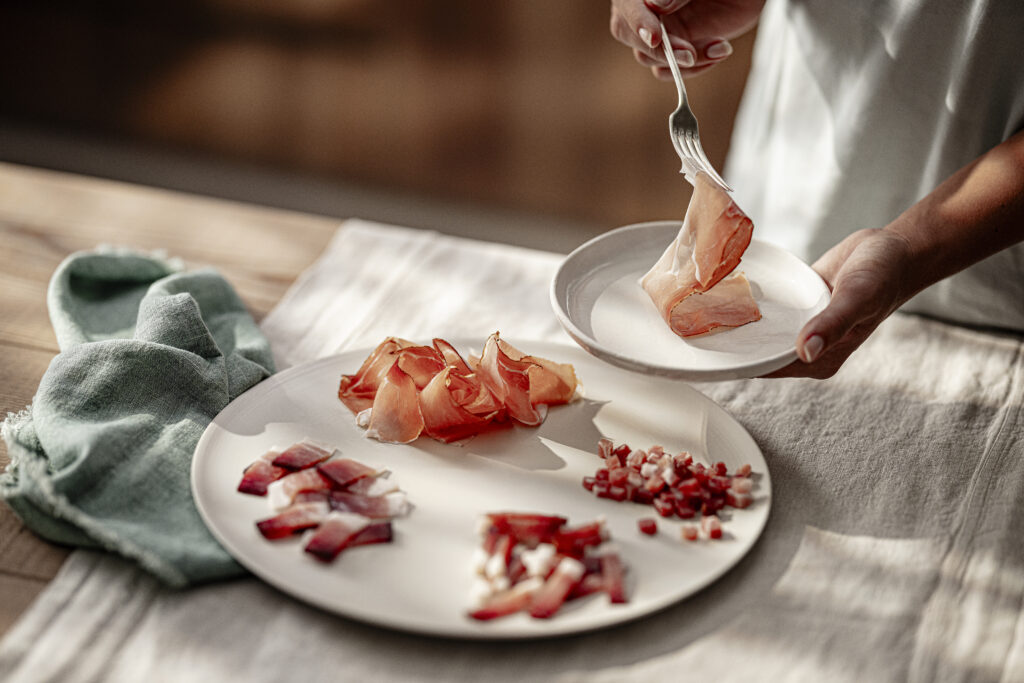 Speck Alto Adige IGP e Vino Alto Adige. Un incontro di gusto